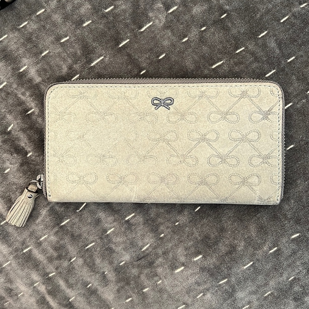 Anya Hindmarch Grey Suede Long Wallet. Zip close. Tassel. Coin slot